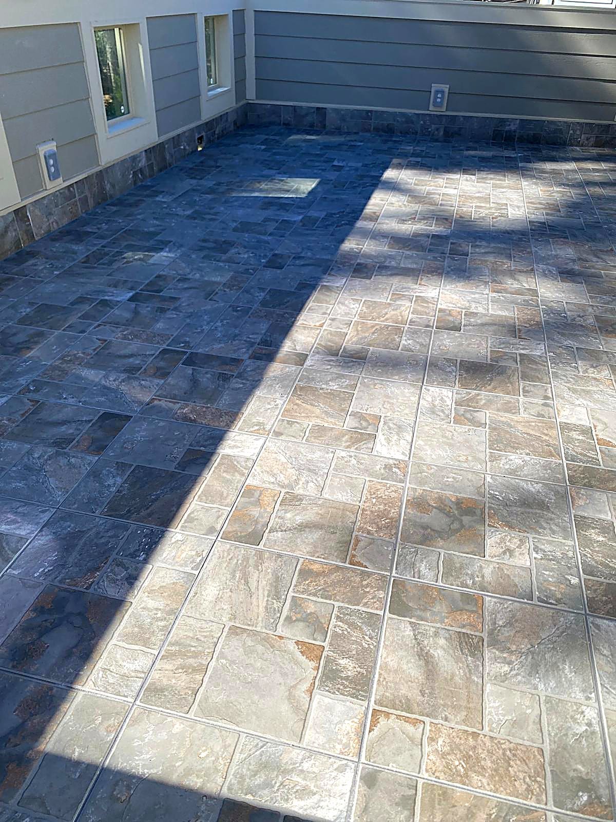Stone tile patio installation